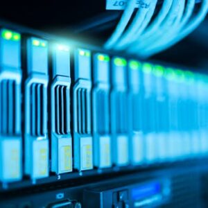 Detailed image of a server rack with glowing lights in a modern data center.