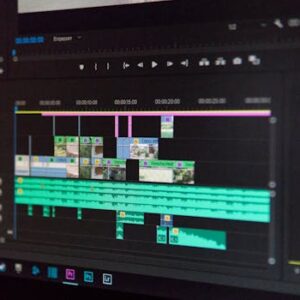 Close-up of a video editing timeline interface on a computer screen, showcasing professional software in action.