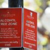 Close-up of red Cheltenham alcohol-free zone sign with maximum penalty warning.