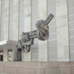 A symbolic sculpture of a knotted gun promoting non-violence at the United Nations in NYC.