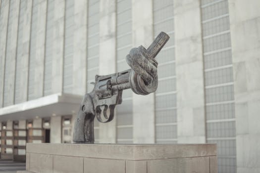 A symbolic sculpture of a knotted gun promoting non-violence at the United Nations in NYC.