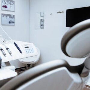 Bright dental office showcasing modern equipment and clean, sleek design.