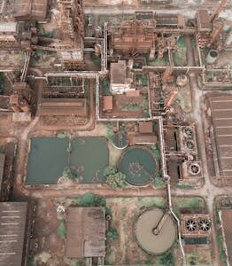 Aerial shot of a large wastewater treatment plant with a focus on environmental sustainability in Malaysia.