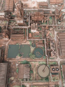 Aerial shot of a large wastewater treatment plant with a focus on environmental sustainability in Malaysia.