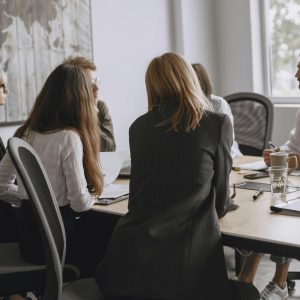 Colleagues in a productive meeting at a modern office, fostering teamwork and collaboration.