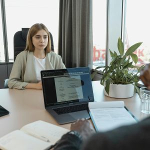 A professional job interview scene in a modern office setting, emphasizing recruitment and career opportunities.